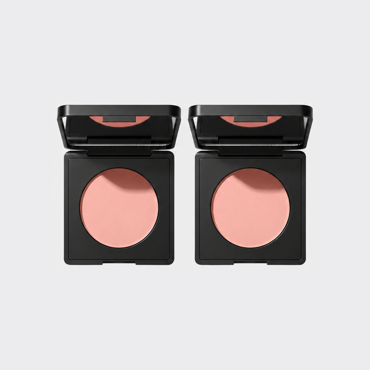 Two Luminance Milano Under-Eye Brightener compacts on a grey background