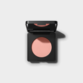 Luminance Milano Under-Eye Brightener compact, open, on a grey background