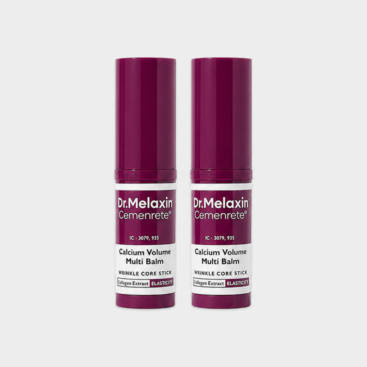 Two Dr. Melaxin Multi-Balm sticks on a grey background